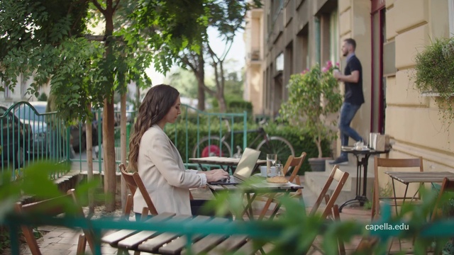 Video Reference: Plant, Furniture, Table, Building, Laptop, Window, Tree, Chair, Urban design, Leisure