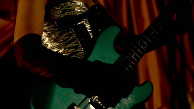 Video Reference: Musical instrument, String instrument, Musician, Green, Guitarist, Musical instrument accessory, Guitar, Guitar accessory, String instrument accessory, Plucked string instruments
