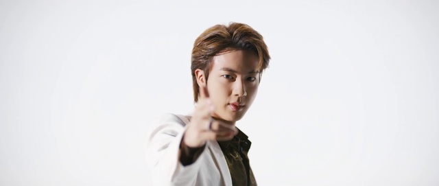 Video Reference: Lip, Eyelash, Dress shirt, Flash photography, Neck, Jaw, Sleeve, Gesture, Bangs, Blazer