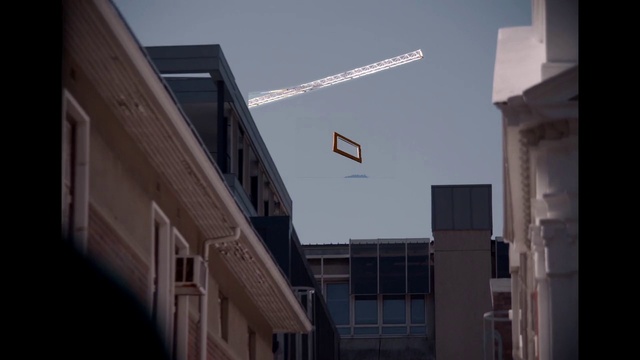 Video Reference: Sky, Building, Window, Material property, Flag, Cloud, Facade, Urban design, City, Space