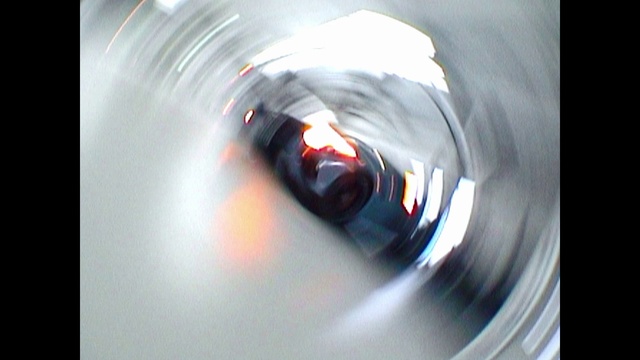 Video Reference: Automotive lighting, Liquid, Automotive design, Amber, Circle, Auto part, Font, Drink, Electric blue, Macro photography