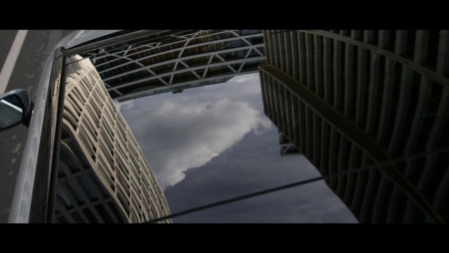 Video Reference: Building, Cloud, Skyscraper, Sky, Grey, Tower block, Composite material, Tints and shades, City, Tower