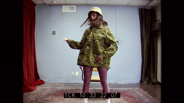 Video Reference: Joint, Shoulder, Curtain, Fashion, Sleeve, Waist, Fashion design, Sunglasses, Flooring, Cap