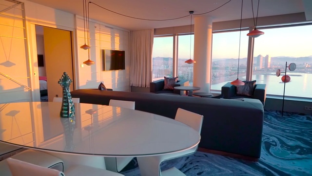 Video Reference: Table, Furniture, Property, Building, Light, Couch, Window, Lighting, Interior design, Shade