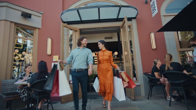 Video Reference: Trousers, Furniture, Photograph, Chair, Orange, Interior design, Table, Door, Leisure, Event