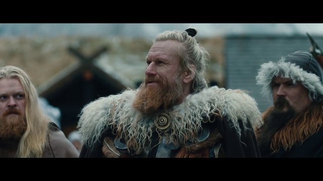 Video Reference: Beard, Facial hair, Jacket, Moustache, Happy, Animal product, Event, Fur, Street fashion, Wrinkle