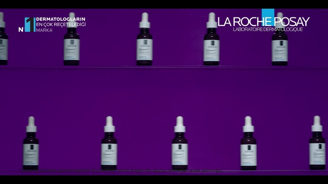 Video Reference: Brown, Liquid, Bottle, White, Light, Product, Purple, Glass bottle, Font, Violet