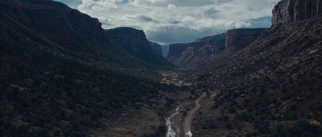 Video Reference: Cloud, Sky, Mountain, Highland, Bedrock, Terrain, Geological phenomenon, Formation, Landscape, Outcrop