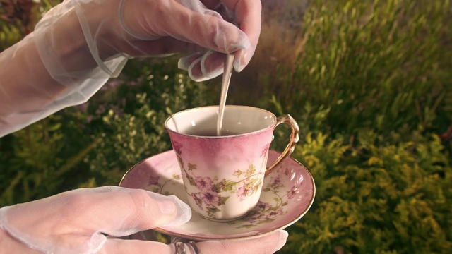Video Reference: Hand, Tableware, Drinkware, Coffee cup, Dishware, Food, Cup, Tea, Serveware, Teacup