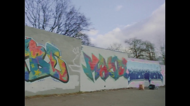 Video Reference: Sky, Paint, Tree, Cloud, Art, Font, Graffiti, Painting, Tints and shades, Facade