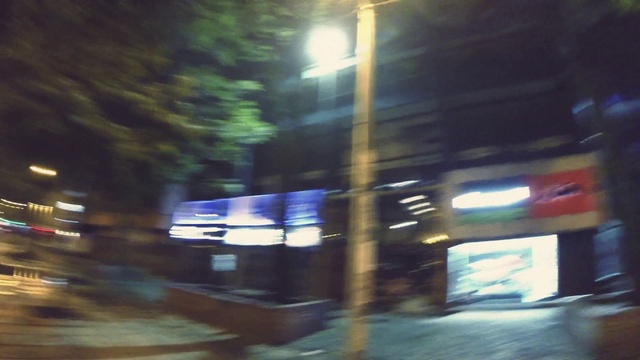 Video Reference: Automotive lighting, Road surface, Street light, Electricity, Tints and shades, Midnight, City, Automotive exterior, Electric blue, Road