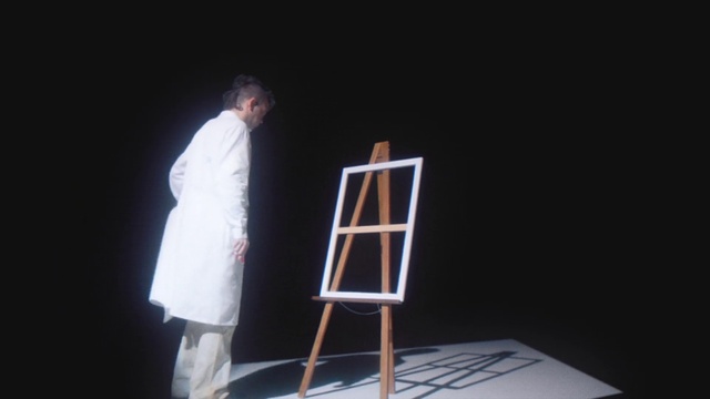 Video Reference: Sleeve, Entertainment, Performing arts, Stool, Art, Performance art, Event, Darkness, Acting, Fashion design