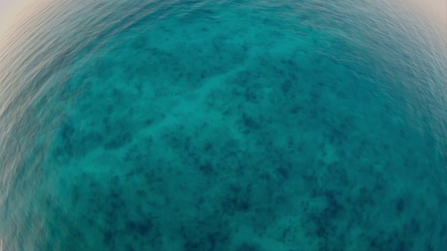 Video Reference: Water, Liquid, Fluid, Swimming pool, Circle, Electric blue, Reef, Underwater, Fashion accessory, Island