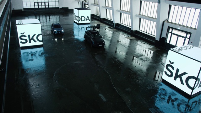 Video Reference: Road surface, Style, Asphalt, Black-and-white, Automotive tire, Flooring, Window, Vehicle, Floor, Building