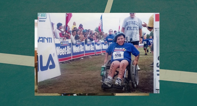 Video Reference: Tire, Wheel, Sports uniform, Wheelchair, Smile, Racing, Jersey, Competition event, Grass, Sports equipment