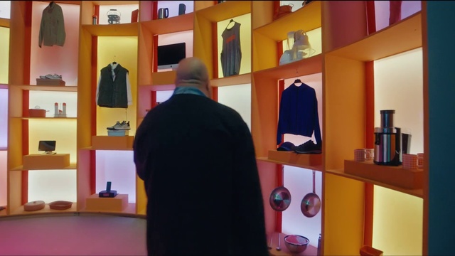 Video Reference: Fashion, Shelf, Interior design, Shelving, Sleeve, Blazer, Art, Event, Room, Retail