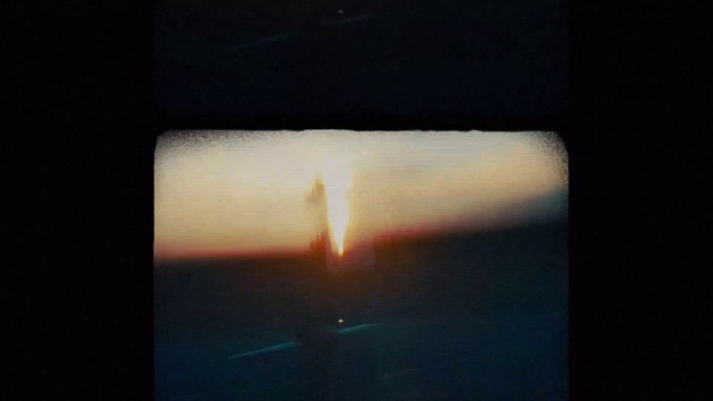 Video Reference: Sky, Rectangle, Wood, Window, Horizon, Gas, Tints and shades, Font, Cloud, Heat