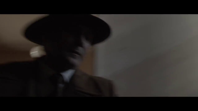 Video Reference: Hat, Flash photography, Eyelash, Font, Cap, Darkness, Monochrome photography, Eyewear, Fashion accessory, Audio equipment