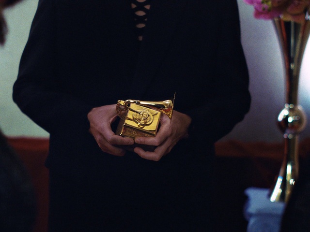 Video Reference: Hand, Dress shirt, Sleeve, Gesture, Eyewear, Collar, Finger, Waist, Wrist, Blazer