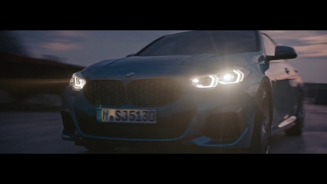 Video Reference: Vehicle registration plate, Grille, Tire, Vehicle, Car, Hood, Automotive tire, Automotive lighting, Wheel, Sky