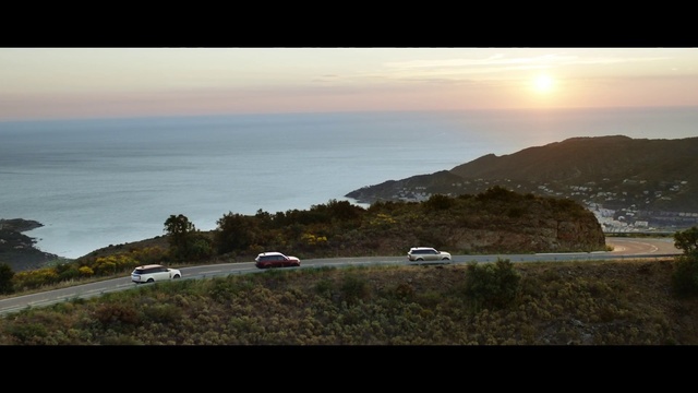 Video Reference: Water, Car, Sky, Cloud, Natural landscape, Highland, Coastal and oceanic landforms, Terrain, Plant, Sunrise