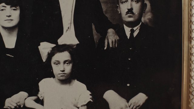 Video Reference: vintage, black and white, portrait, family, old photo, framed picture, historical, people, studio photo