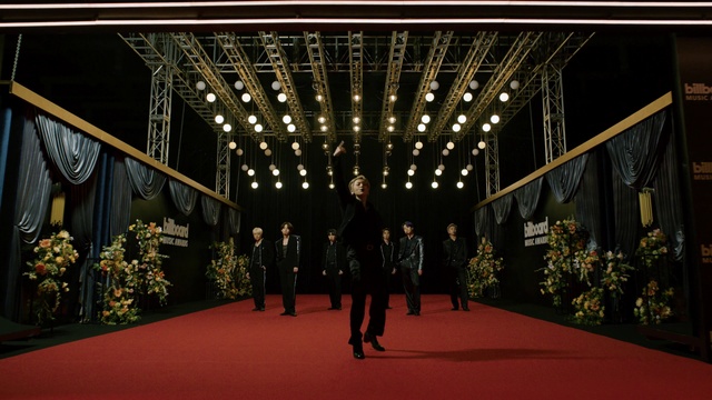 Video Reference: Plant, Dress, Flooring, Red carpet, Formal wear, Event, Carpet, Fun, Fashion design, Symmetry