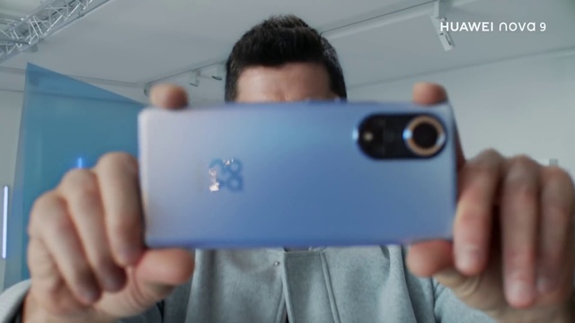 Video Reference: Hand, White, Mobile phone, Communication Device, Sleeve, Telephony, Gadget, Gesture, Portable communications device, Finger