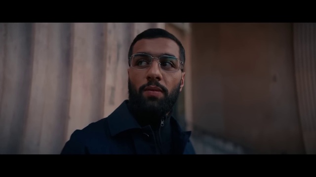 Video Reference: Forehead, Glasses, Chin, Vision care, Eyebrow, Beard, Mouth, Flash photography, Jaw, Eyewear