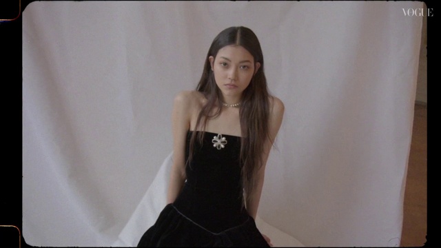 Video Reference: Eyelash, Flash photography, Sleeve, Dress, Waist, Gesture, Day dress, Thigh, Bridal party dress, Trunk