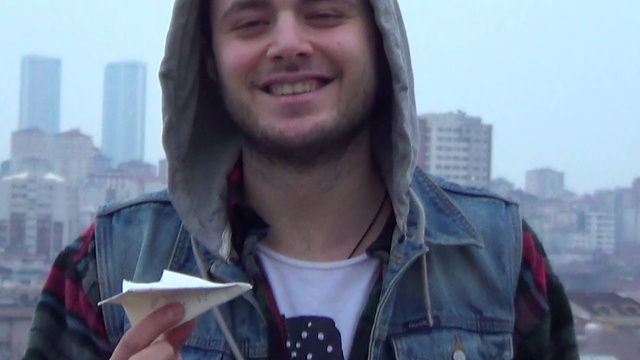 Video Reference: Forehead, Lip, Smile, Outerwear, Hairstyle, Mouth, Beard, Jaw, Eyewear, Gesture