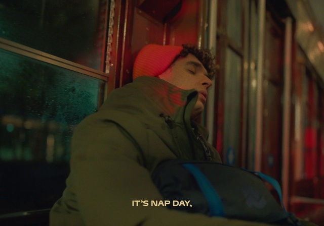 Video Reference: Sleeve, Jacket, Tints and shades, Fun, Magenta, Public transport, Sitting, Darkness, Cap, Facial hair