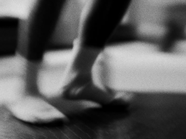 Video Reference: Gesture, Knee, Finger, Tints and shades, Human leg, Monochrome photography, Entertainment, Monochrome, Foot, Event