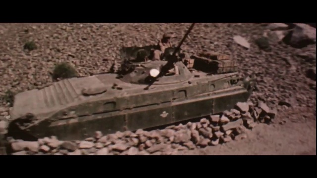 Video Reference: Self-propelled artillery, Combat vehicle, Tank, Vehicle, Motor vehicle, Automotive tire, Military vehicle, Wood, Automotive wheel system, Soil