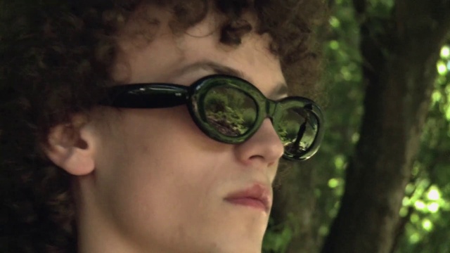 Video Reference: Glasses, Lip, Chin, Vision care, Eyebrow, Eyelash, Eye glass accessory, Goggles, Eyewear, Flash photography