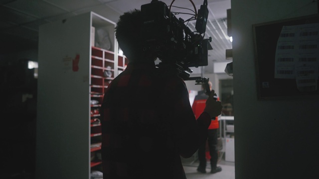 Video Reference: Art, Event, Darkness, Fashion design, Visual arts, Room, Carmine, Personal protective equipment, Shadow, Backlighting