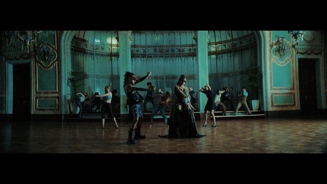 Video Reference: Performing arts, Entertainment, Dress, Performance art, Dance, Event, Chair, Electric blue, Choreography, Stage