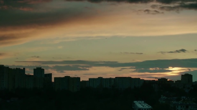 Video Reference: Cloud, Sky, Atmosphere, Afterglow, Sunlight, Tower block, Dusk, Atmospheric phenomenon, Cumulus, Horizon