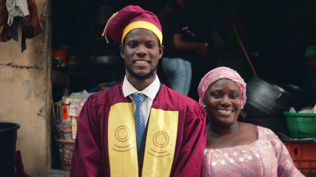 Video Reference: Smile, Outerwear, Dress, Headgear, Community, Happy, Cap, Event, Entertainment, Jewellery