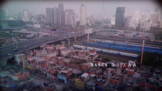 Video Reference: Building, Skyscraper, Light, Sky, Tower block, Cloud, Urban design, Cityscape, Neighbourhood, Residential area