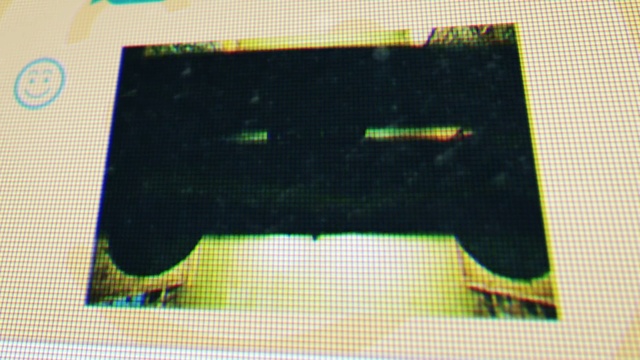 Video Reference: Rectangle, Font, Sleeve, Pattern, Tints and shades, Electric blue, Gadget, Symmetry, Video game accessory, Composite material