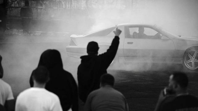 Video Reference: Clothing, Vehicle, Car, Hood, Automotive lighting, Automotive design, Motor vehicle, Gesture, Cloud, Style