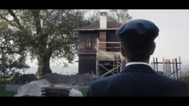 Video Reference: Building, Hat, Sky, Dress shirt, Tree, Travel, Cap, Military person, Official, House