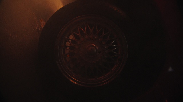 Video Reference: Brown, Automotive tire, Automotive lighting, Wood, Gas, Rim, Tints and shades, Tread, Darkness, Circle