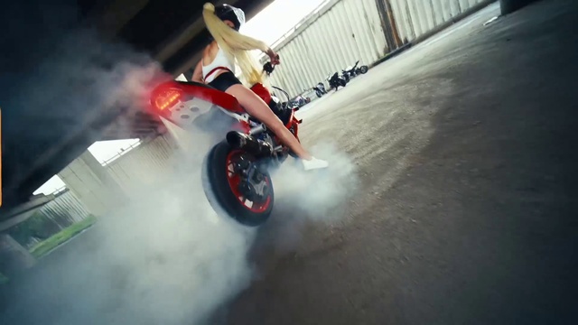 Video Reference: Wheel, Tire, Vehicle, Automotive tire, Flash photography, Automotive design, Helmet, Motorcycle, Automotive lighting, Rolling