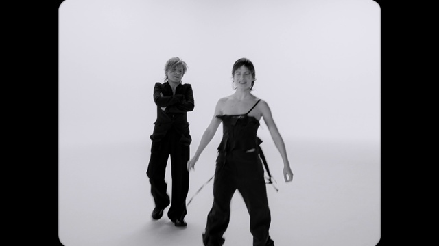 Video Reference: Flash photography, Sleeve, Gesture, Style, Black-and-white, Font, Formal wear, Monochrome photography, People in nature, Monochrome