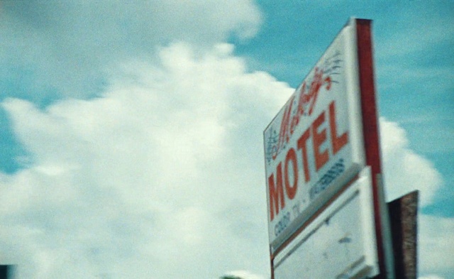 Video Reference: Cloud, Sky, Rectangle, Font, Cumulus, Gas, Tints and shades, Tree, Signage, Billboard