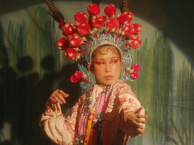 Video Reference: Temple, Headgear, Peking opera, Headpiece, Art, Entertainment, Sculpture, Event, Crown, Jewellery