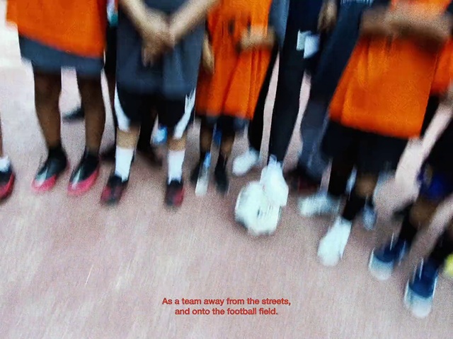 Video Reference: Gesture, Jersey, Sportswear, Flooring, Font, Fun, Event, Electric blue, Human leg, Leisure