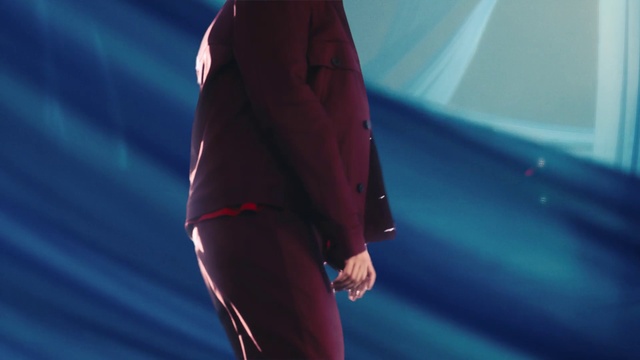 Video Reference: Shoulder, Azure, Human body, Performing arts, Thigh, Sportswear, Entertainment, Elbow, Electric blue, Magenta